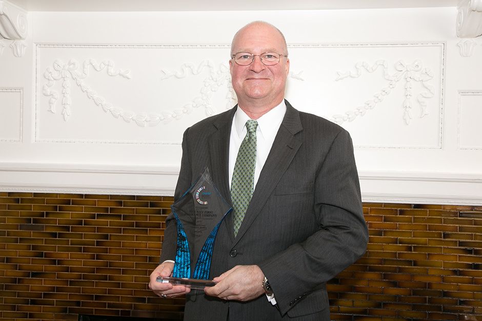Werner Kruck, chief operating officer, receives Celent Model Insurer Award on behalf of Security First Insurance Company