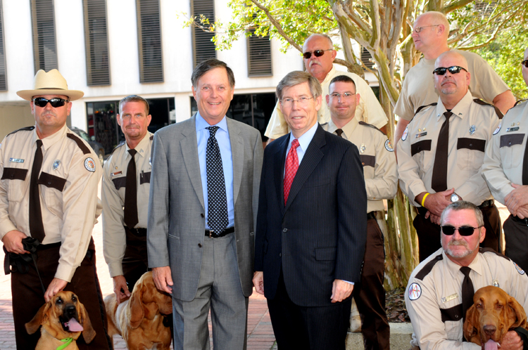 Locke Burt, Attorney General Bill McCollum, law enforcement officers, and the bloodhounds used in search and rescue efforts attended the ceremony in Tallahassee to help increase awareness of Floridas missing children.